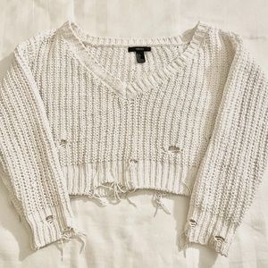 Cropped distressed white knit sweater
